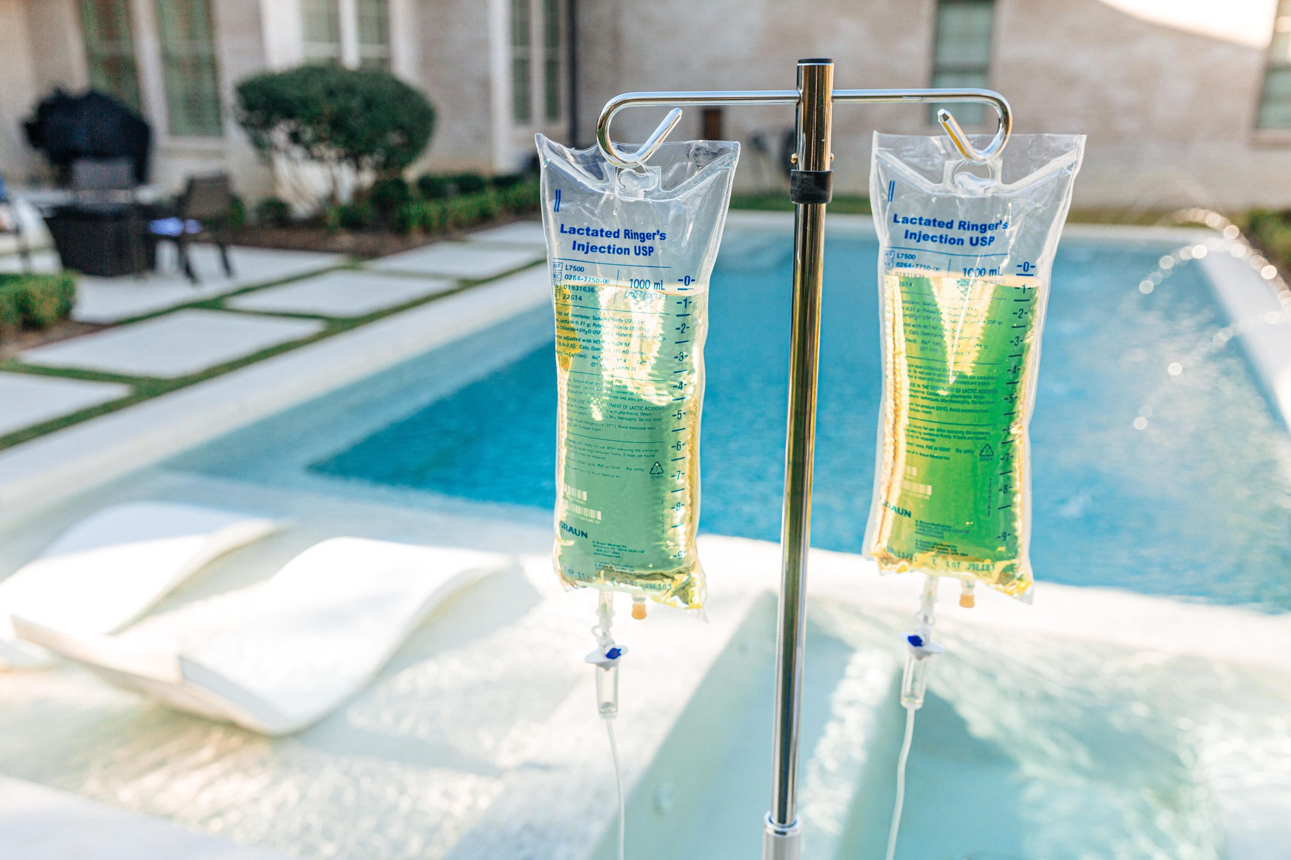 iv hydration bags by swimming pool